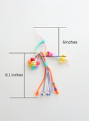 Colorful bag charms with beads and a smiley flower placed on a white background with measurement which is 5inches of the top holder part and 6.1inches of the body of bag charm