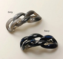 Two chunky chain-link hair clips in Gray and Navy tones, displayed in white background.